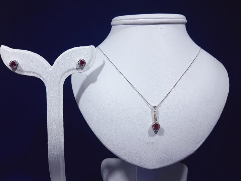 orecchini in oro bianco 18 Kt. con rubini e diamanti naturali