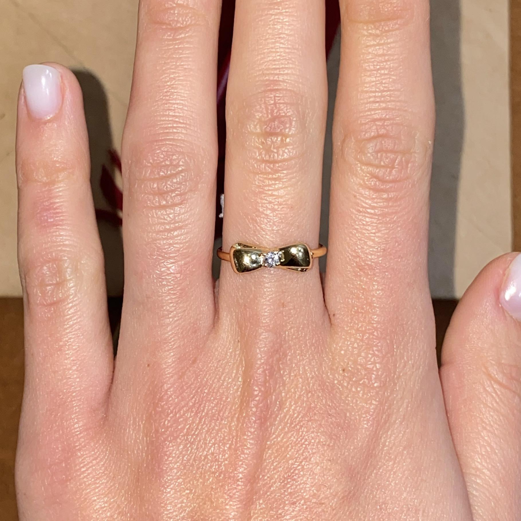 Anello vintage fiocco in oro 18kt con diamante ct 0,07 ca.