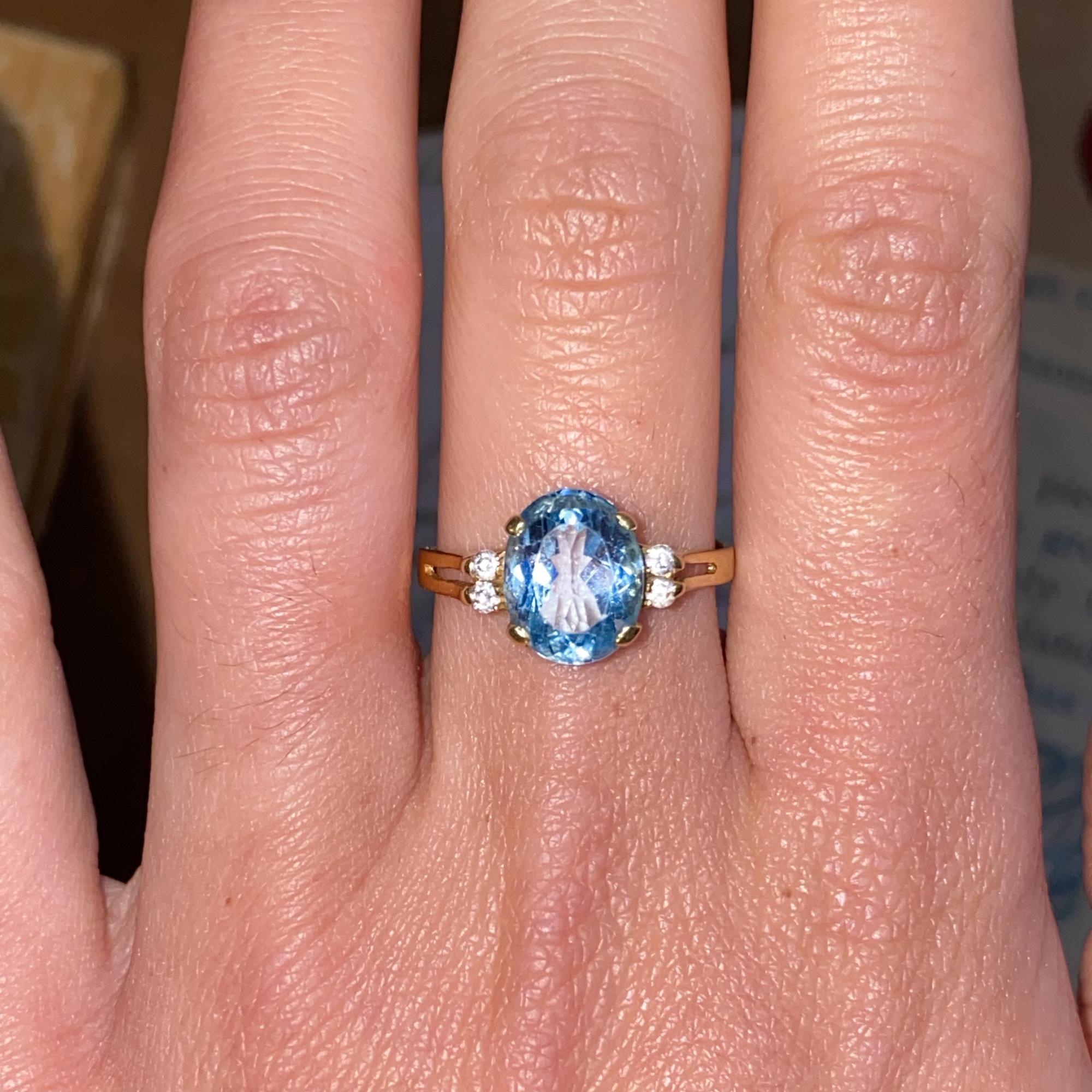 Anello vintage in oro 18kt con topazio azzurro e zirconi