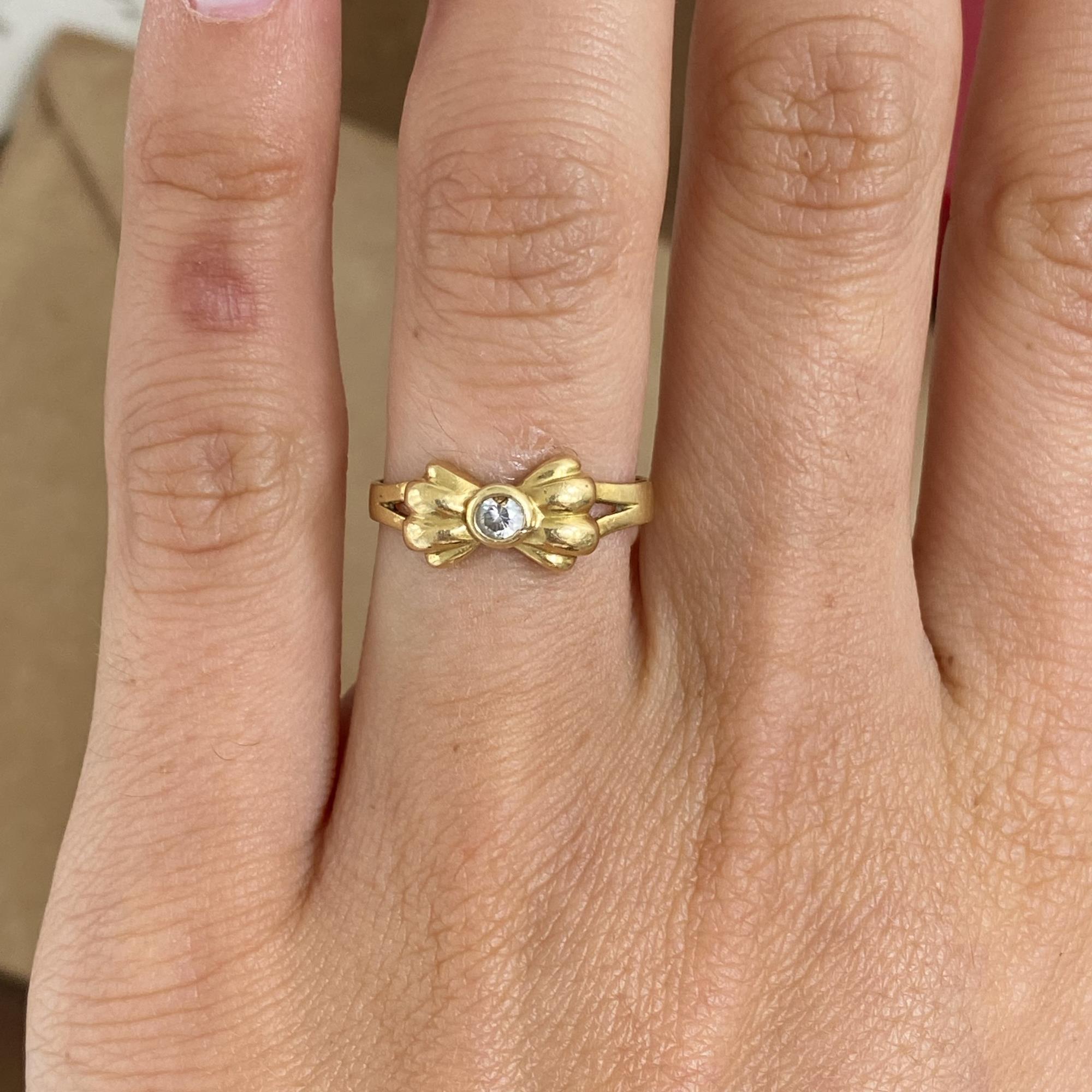 Anello vintage in oro 18kt fiocco con zircone