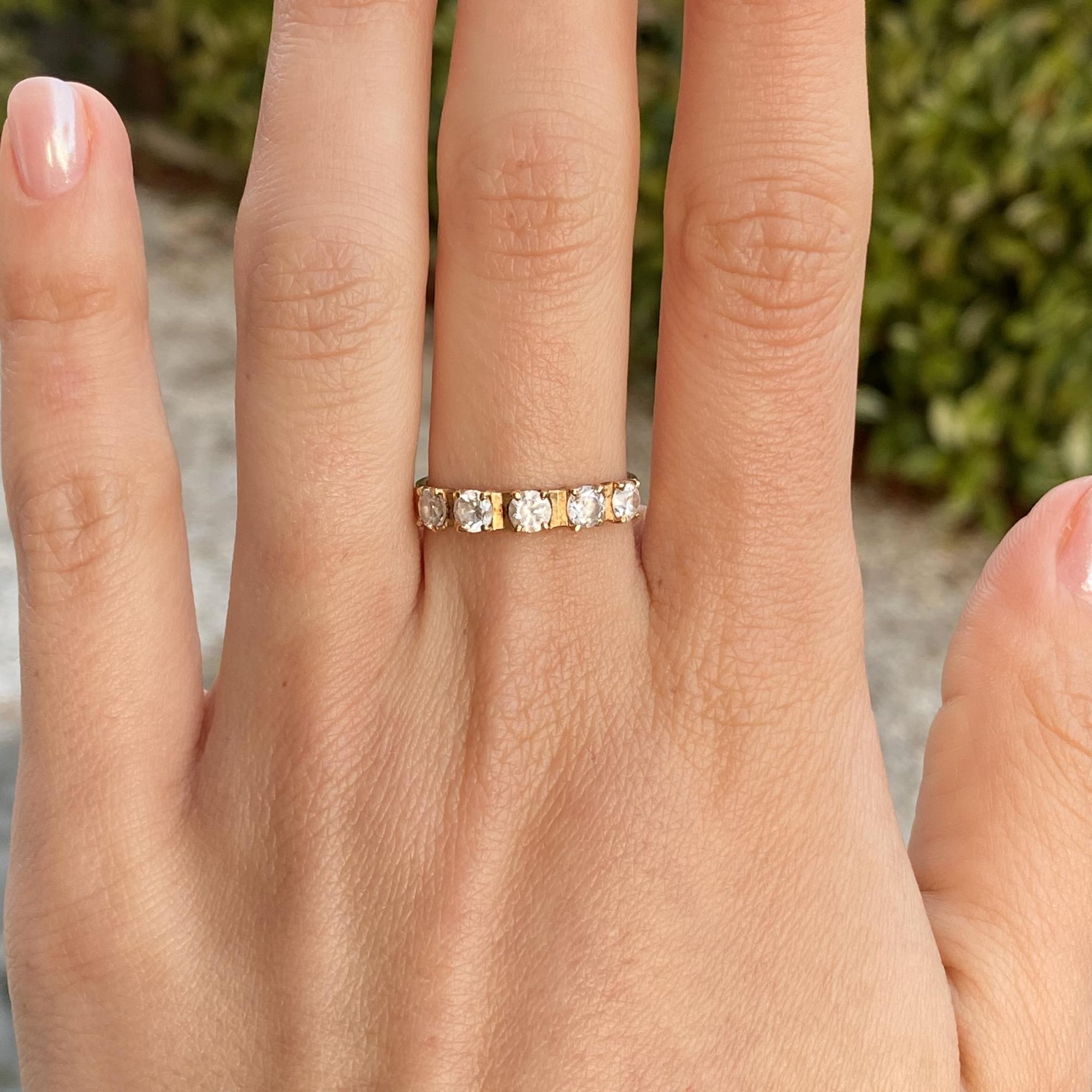 Anello vintage in oro 18kt rivière con 5 zirconi