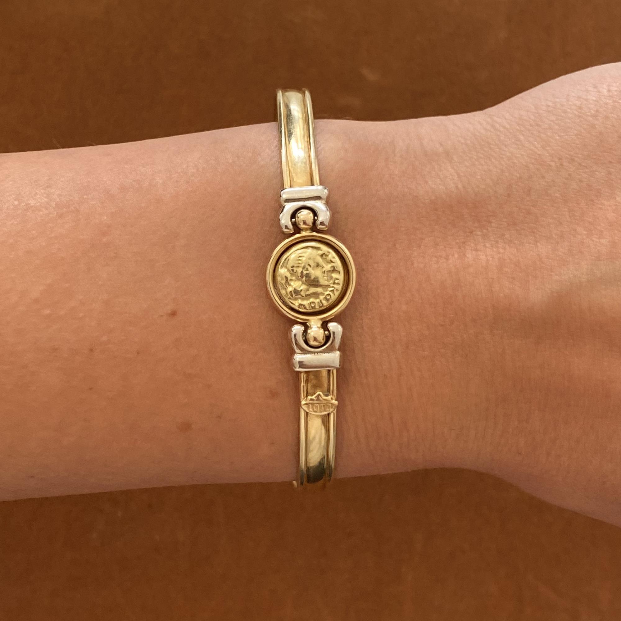 Bracciale rigido firmato   LOTO   con moneta centrale