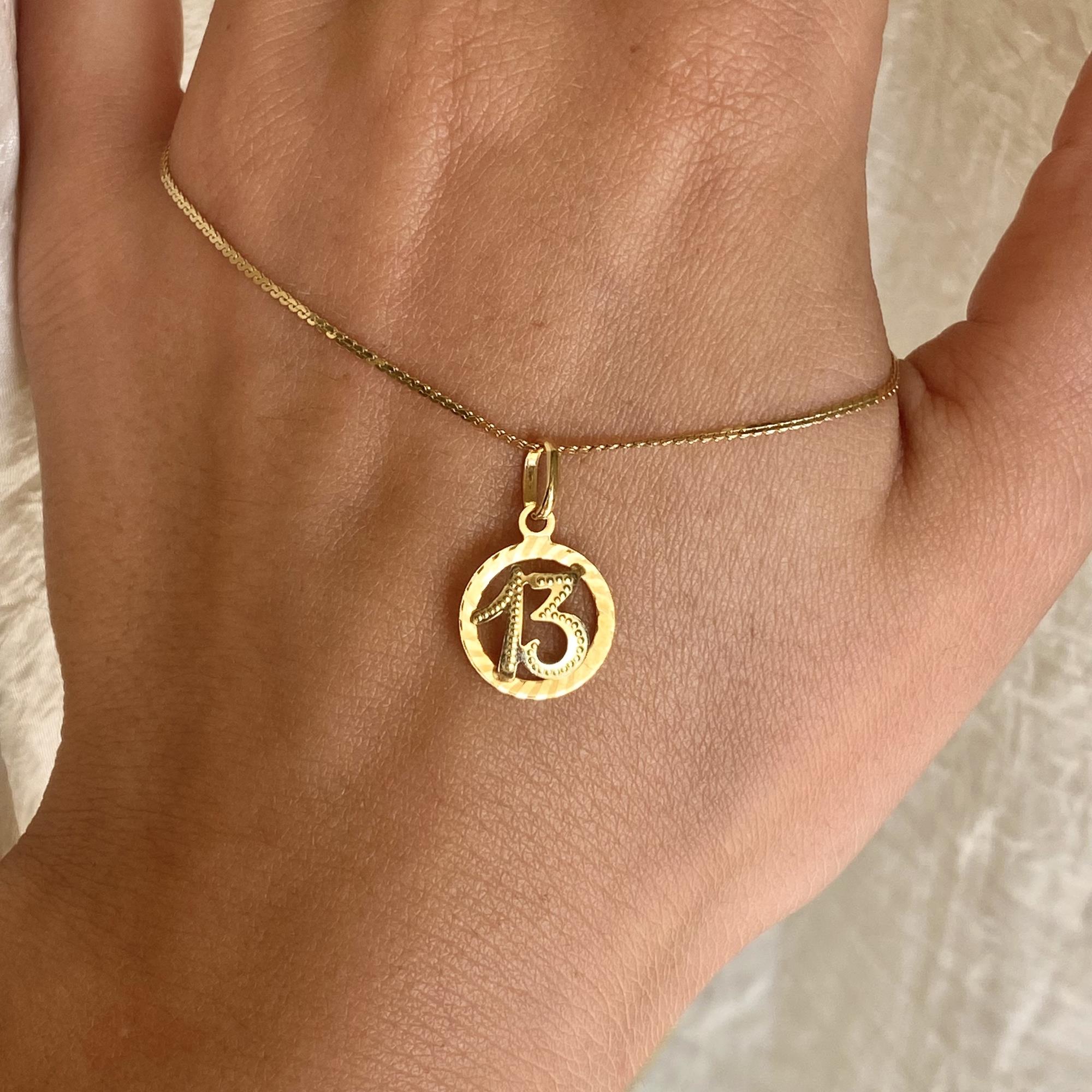 Ciondolo vintage in oro 18kt numero 13 portafortuna