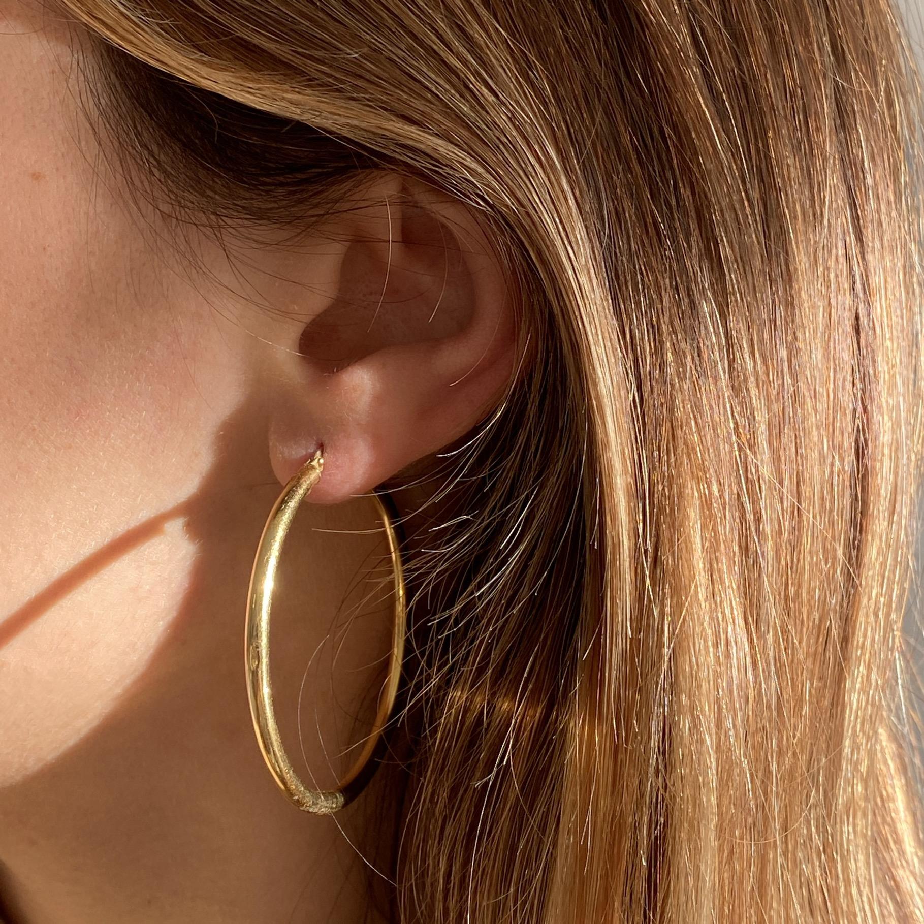 Orecchini vintage cerchio tubolare in oro 18kt