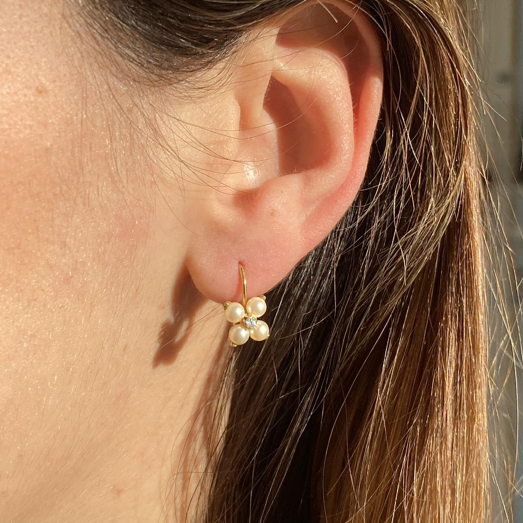 Orecchini vintage in oro 18kt con perline e zircone centrale