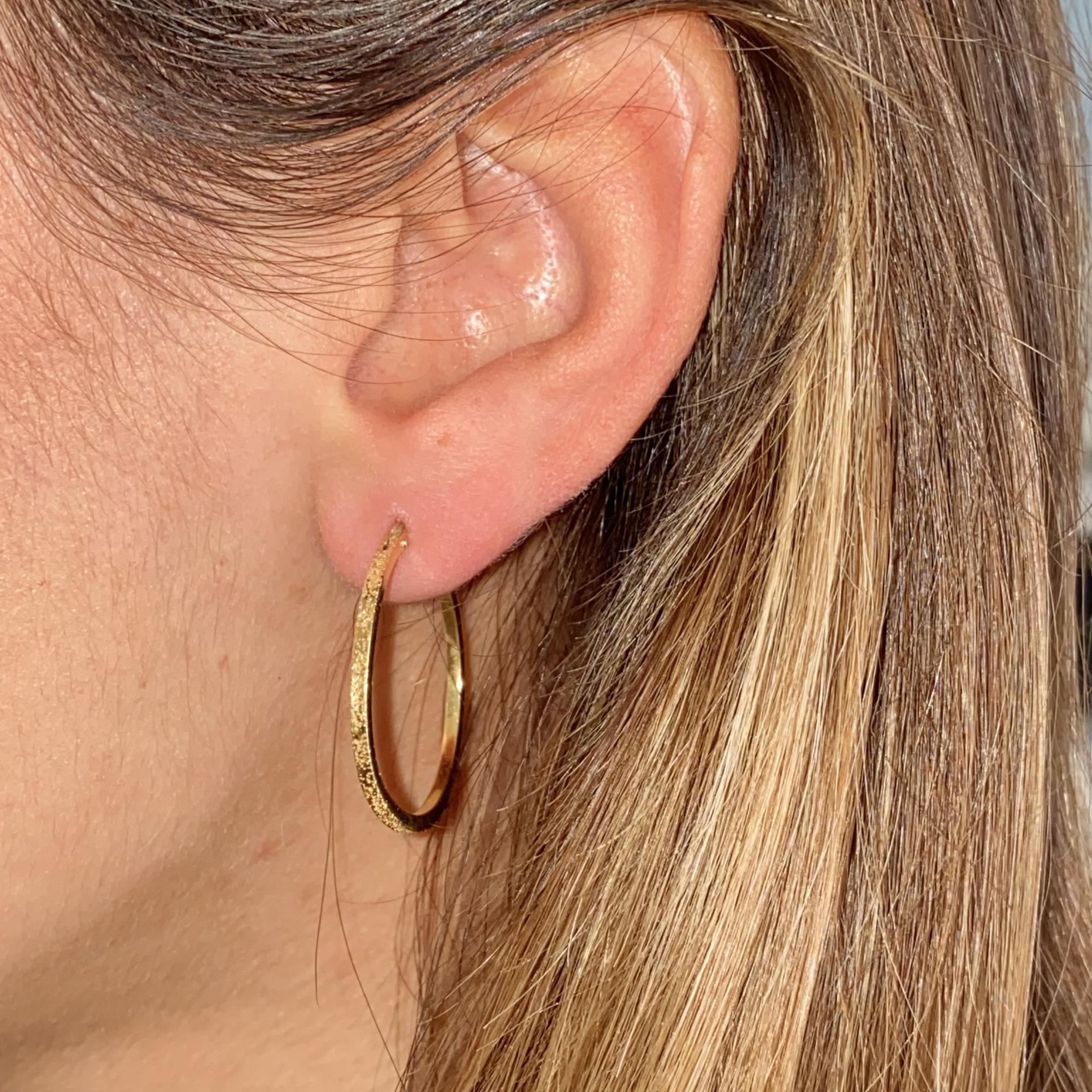 Orecchini vintage in oro 18kt lucidi e brillantati