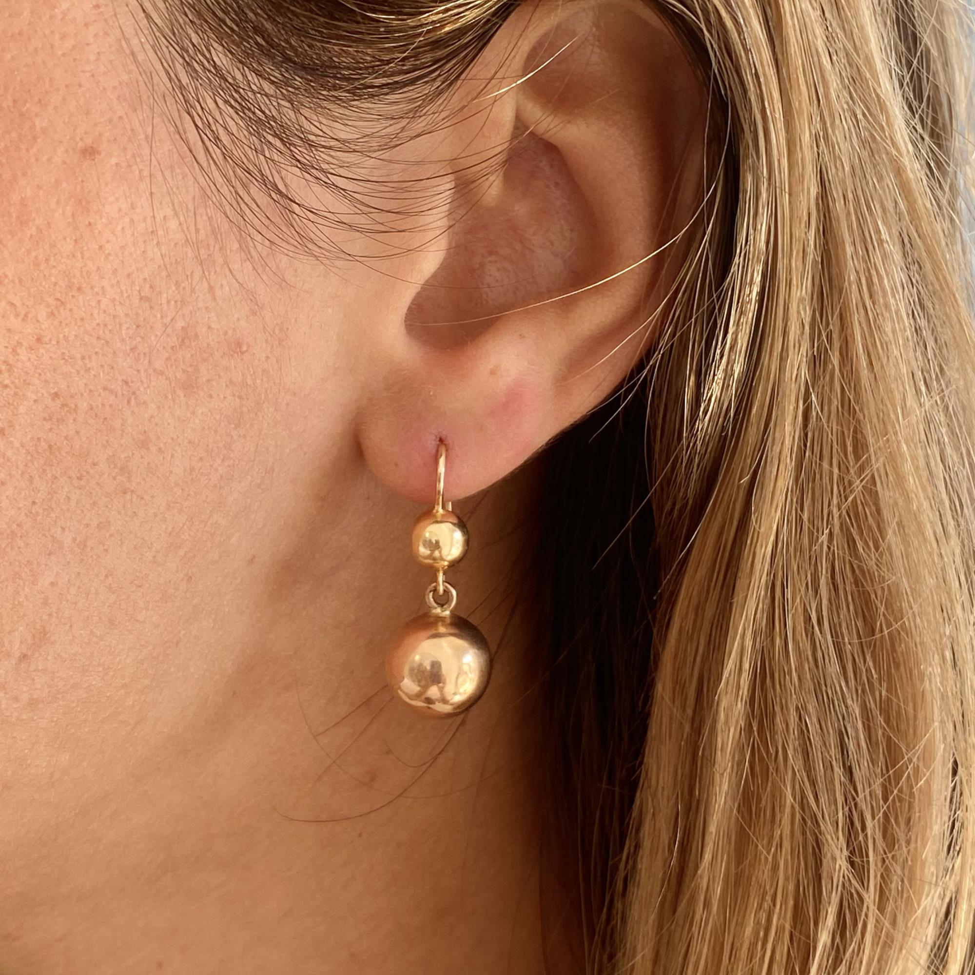 Orecchini vintage in oro 9kt sfere pendenti
